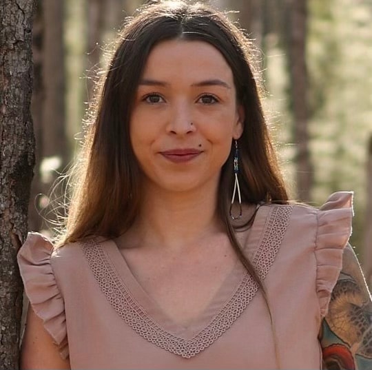 Amy Lynch in a wooded setting